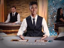 Infinite Blackjack table interface on qqcash188 login showing multiple players betting simultaneously
